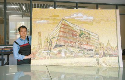 金祥龍創(chuàng)作版畫《悅讀殿堂——上海圖書館東館》。本報記者 張馳 攝